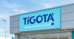 Entrance of Tigotà store with shopping customers